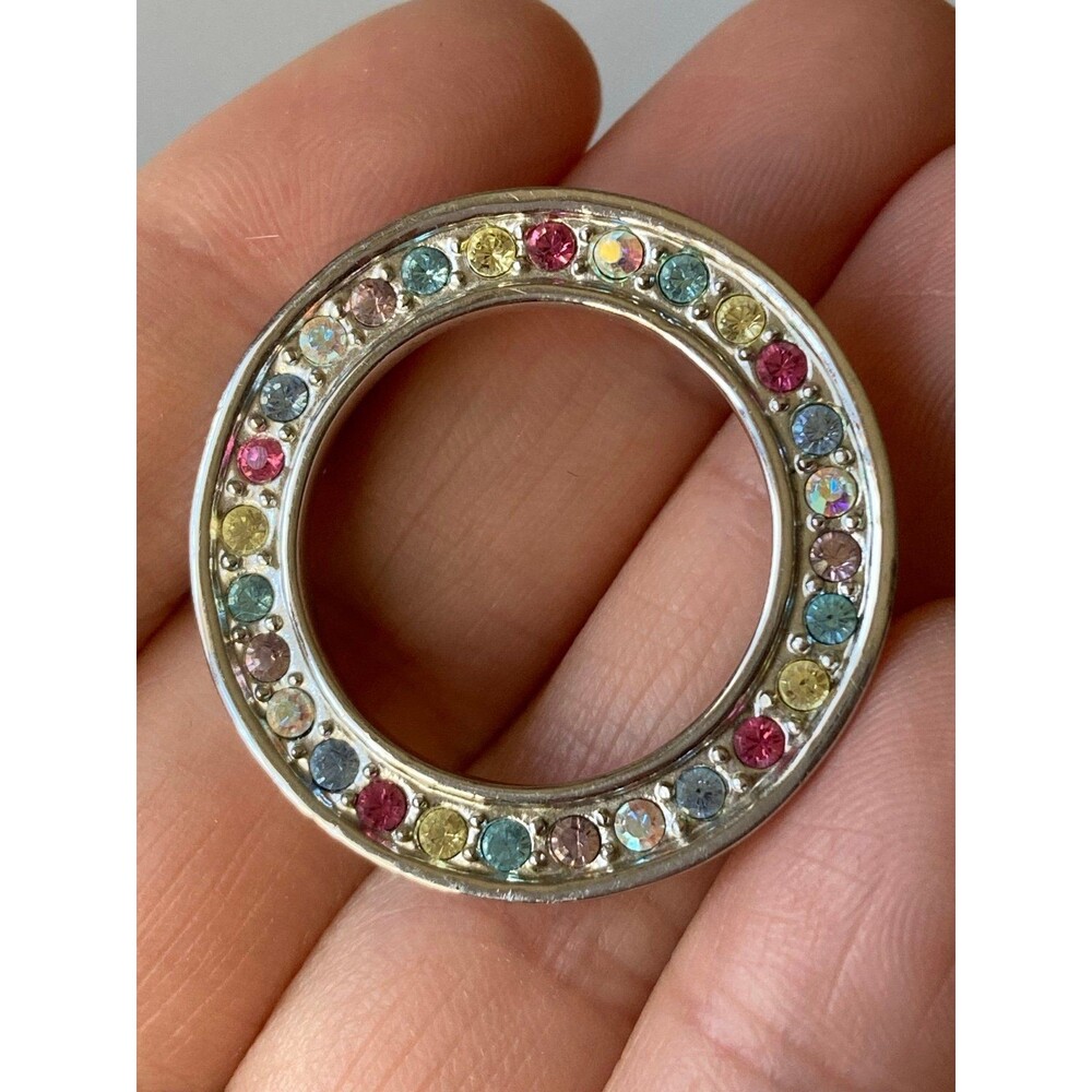 Silver tone multicolored rhinestone circle pendant
